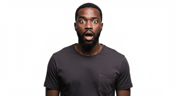 A black man with a shocked expression on his face